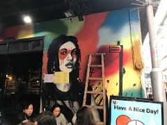 04 Sing Heung Yuen - Gough St - woman with reduced painted eyes street art Hong Kong